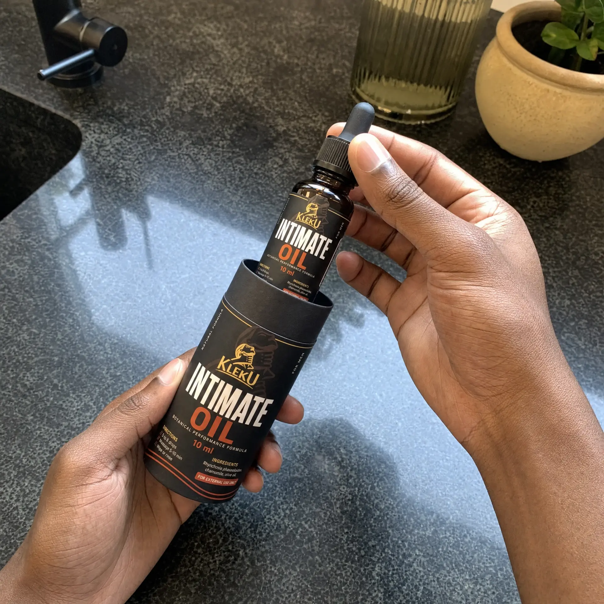 Customer opening his Kleku Intimate Oil package
