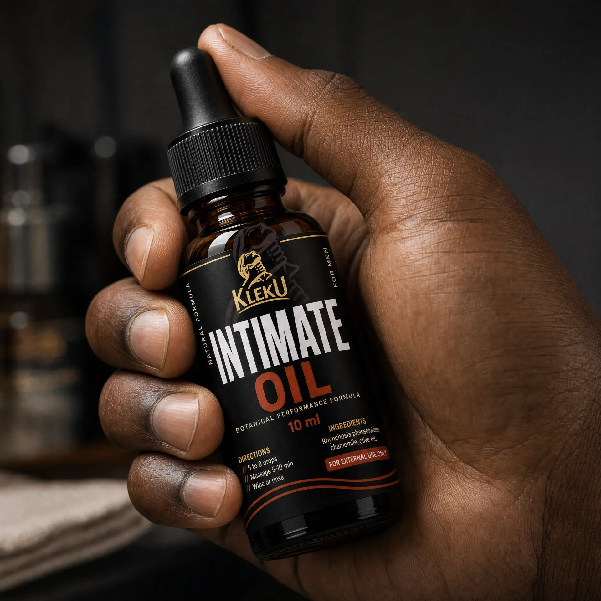 Close-up of Kleku Intimate Oil in a customer's hand
